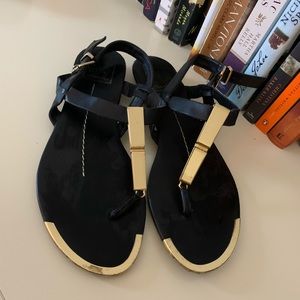 Dolce vita black and gold accent sandals / size 8